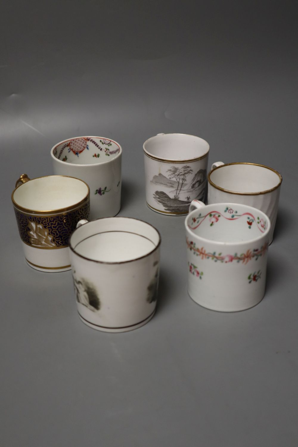 Six coffee cans including Miles Mason, New Hall and Spode, 6cm